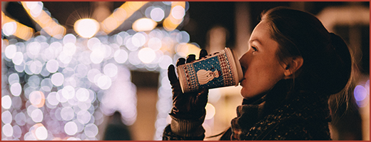 Winter theme woman with Christmas lights.