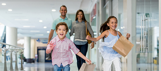 family excited in the mall